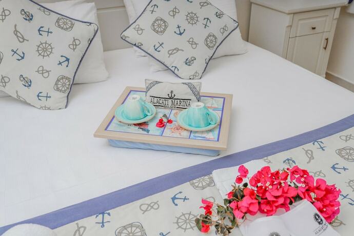 Imagen de la habitación del Alacati Marina Palace Otel. Foto 14