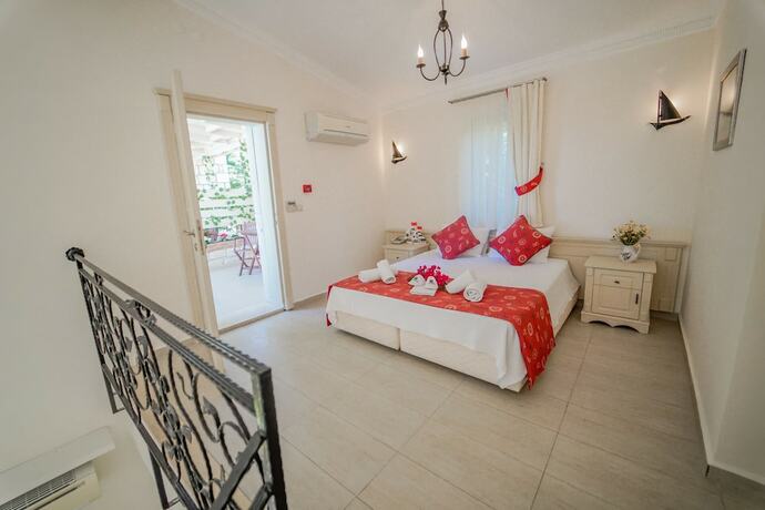 Imagen de la habitación del Alacati Marina Palace Otel. Foto 15