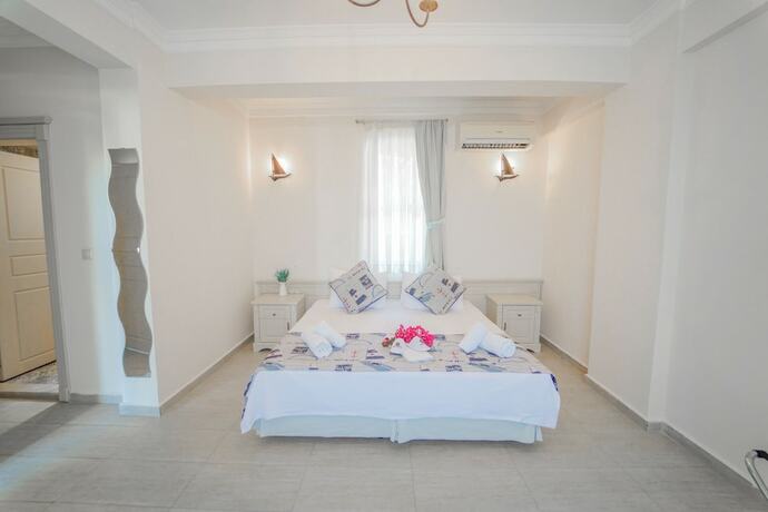 Imagen de la habitación del Alacati Marina Palace Otel. Foto 17