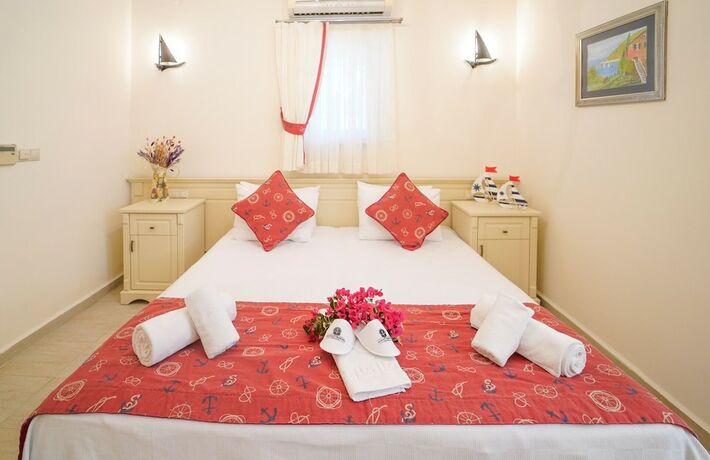 Imagen de la habitación del Alacati Marina Palace Otel. Foto 18