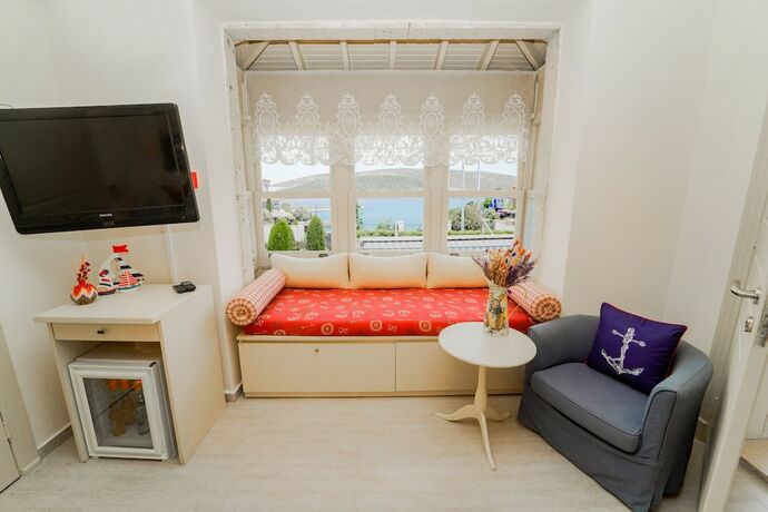Imagen de la habitación del Alacati Marina Palace Otel. Foto 19