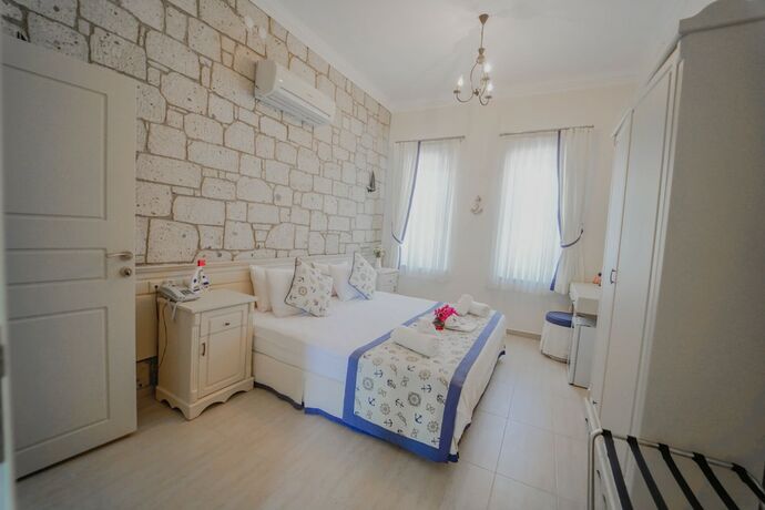 Imagen de la habitación del Alacati Marina Palace Otel. Foto 20