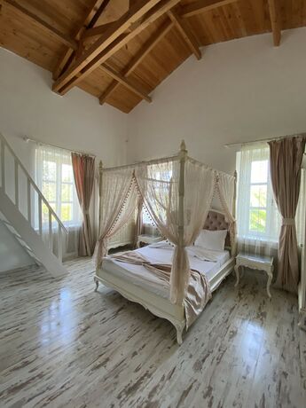 Imagen de la habitación del Alacati Roka Tas Otel. Foto 14