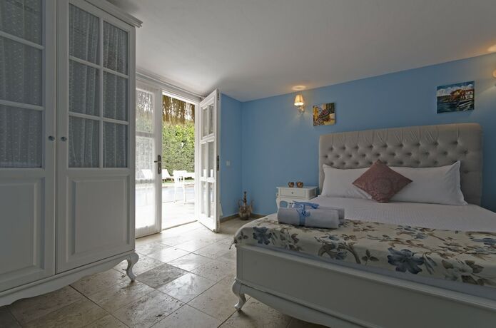 Imagen de la habitación del Alacati Roka Tas Otel. Foto 17