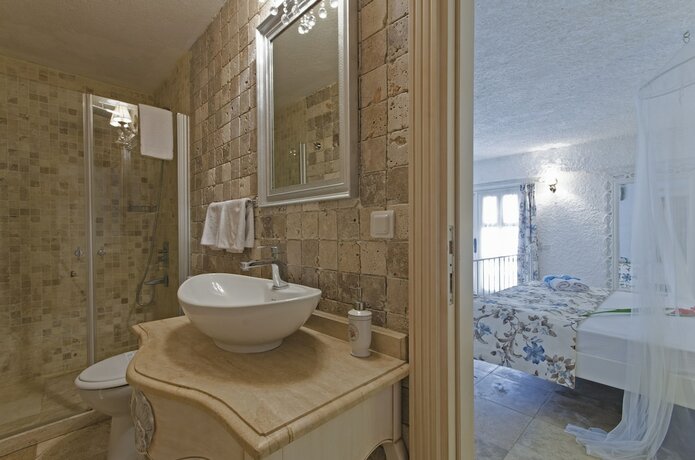 Imagen de la habitación del Alacati Roka Tas Otel. Foto 18