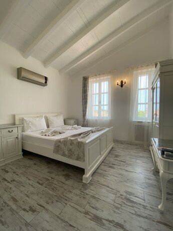 Imagen de la habitación del Alacati Roka Tas Otel. Foto 19