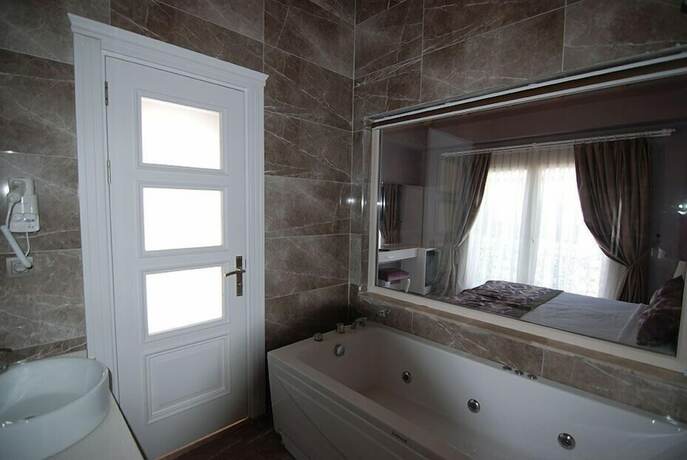 Imagen de la habitación del Alacati The Design Hotel. Foto 14
