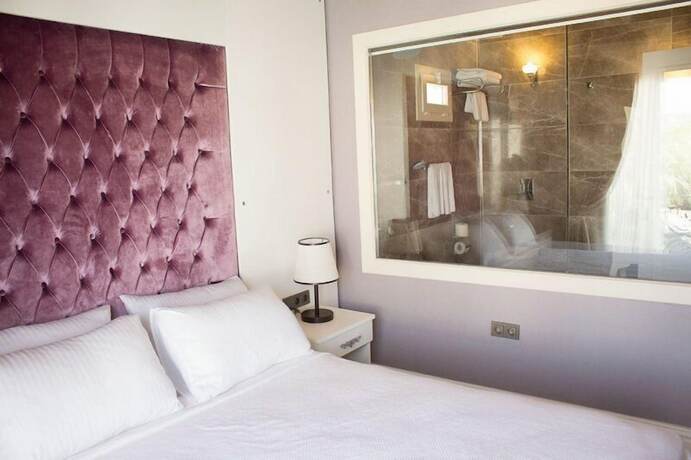 Imagen de la habitación del Alacati The Design Hotel. Foto 19