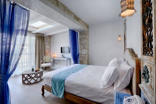 Imagen de la habitación del Alakapi Hotel. Foto 6