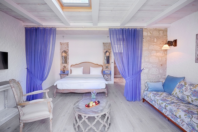 Imagen de la habitación del Alakapi Hotel and Villas. Foto 3