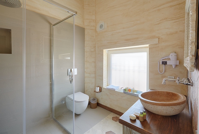 Imagen de la habitación del Alakapi Hotel and Villas. Foto 12