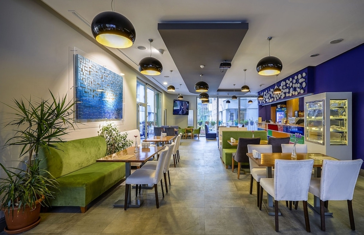 Imagen del bar/restaurante del Alan Suites. Foto 2