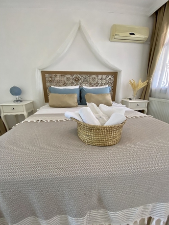 Imagen de la habitación del Alasonya Otel Alacati by Lamira. Foto 7