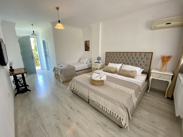 Imagen de la habitación del Alasonya Otel Alacati by Lamira. Foto 9