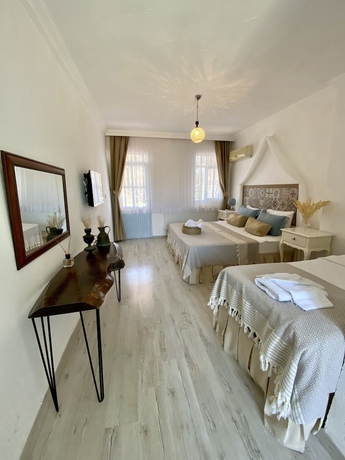 Imagen de la habitación del Alasonya Otel Alacati by Lamira. Foto 13