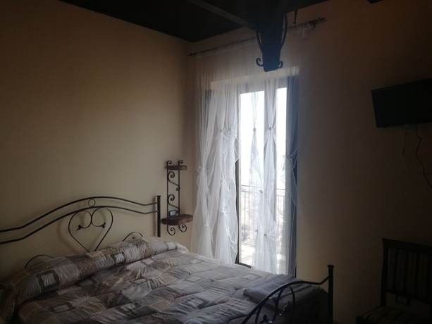 Imagen de la habitación del Albergo Diffuso Borgo Dei Greci. Foto 4