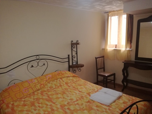 Imagen de la habitación del Albergo Diffuso Borgo Dei Greci. Foto 6
