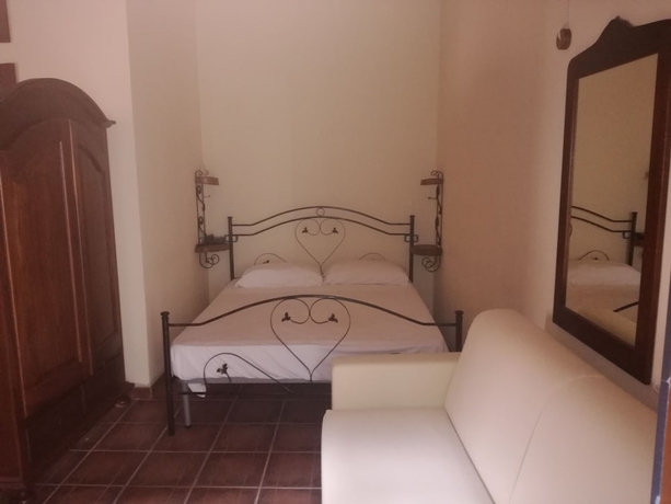 Imagen de la habitación del Albergo Diffuso Borgo Dei Greci. Foto 13