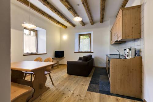 Imagen de la habitación del Albergo Diffuso Sutrio Zoncolan. Foto 3