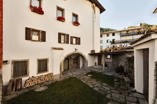 Imagen de la habitación del Albergo Diffuso Sutrio Zoncolan. Foto 7