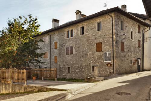 Imagen de la habitación del Albergo Diffuso Sutrio Zoncolan. Foto 8