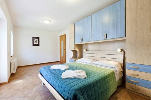 Imagen de la habitación del Albergo Diffuso Sutrio Zoncolan. Foto 11