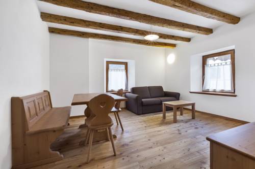 Imagen de la habitación del Albergo Diffuso Sutrio Zoncolan. Foto 13