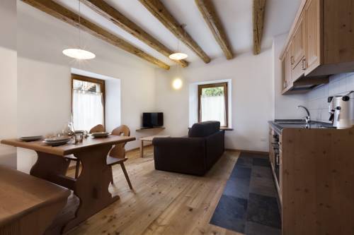 Imagen de la habitación del Albergo Diffuso Sutrio Zoncolan. Foto 16