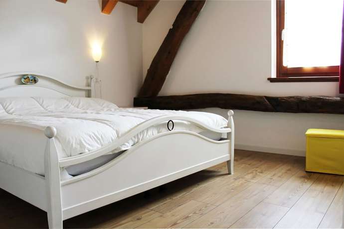 Imagen de la habitación del Albergo Diffuso Zoncolan. Foto 2