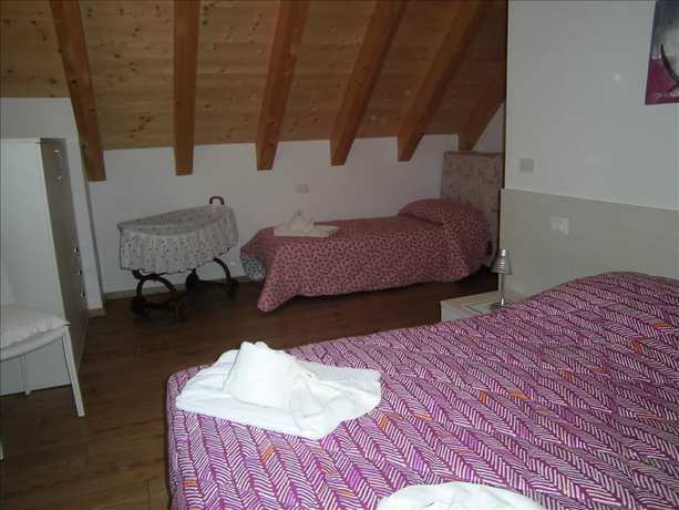 Imagen de la habitación del Albergo Diffuso Zoncolan. Foto 3