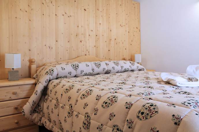 Imagen de la habitación del Albergo Diffuso Zoncolan. Foto 12