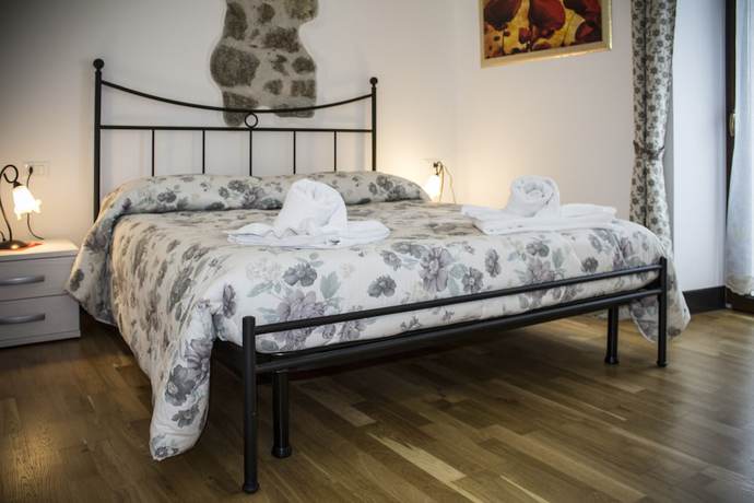 Imagen de la habitación del Albergo Diffuso Zoncolan. Foto 13