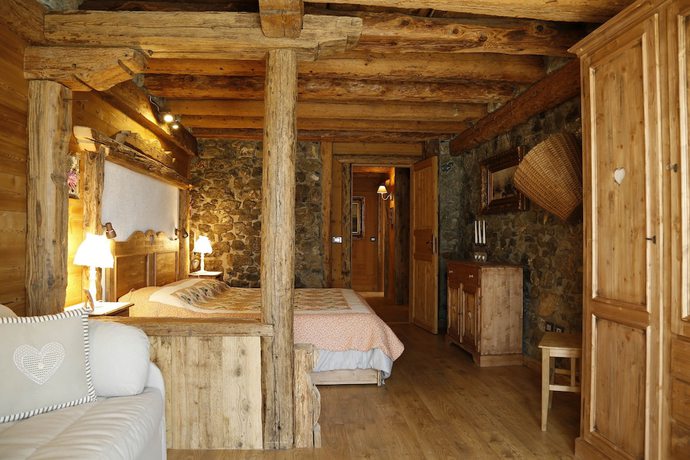 Imagen de la habitación del Albergo Diffuso Zoncolan. Foto 18