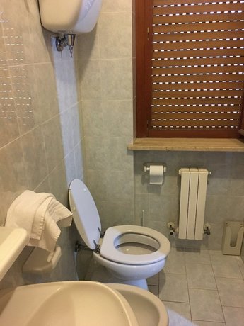 Imagen de la habitación del Albergo Gina. Foto 11