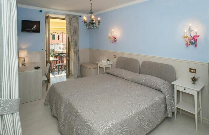 Imagen de la habitación del Albergo Stella della Marina. Foto 19