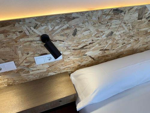 Imagen de la habitación del Albergue Real Fabrica de Ezcaray. Foto 12