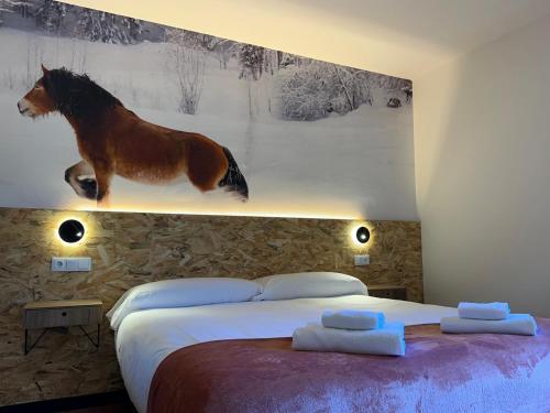 Imagen de la habitación del Albergue Real Fabrica de Ezcaray. Foto 14