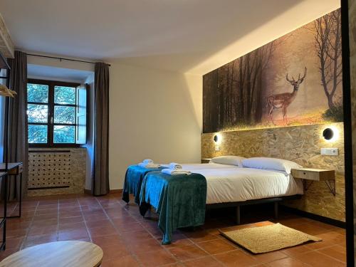 Imagen de la habitación del Albergue Real Fabrica de Ezcaray. Foto 15