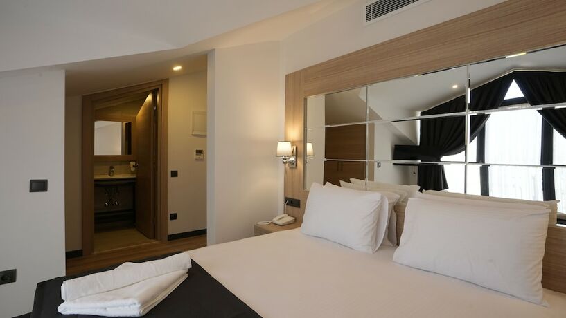 Imagen de la habitación del Alesta Seaside Residence. Foto 20