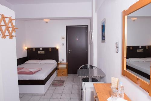Imagen de la habitación del Alexander Beach Hotel. Foto 9