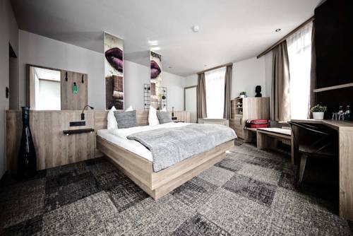 Imagen de la habitación del Alexxanders Restaurant and Bordinghouse. Foto 12