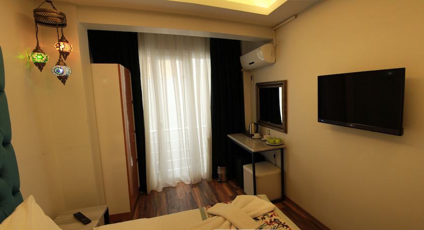 Imagen de la habitación del Alf Hotel. Foto 13