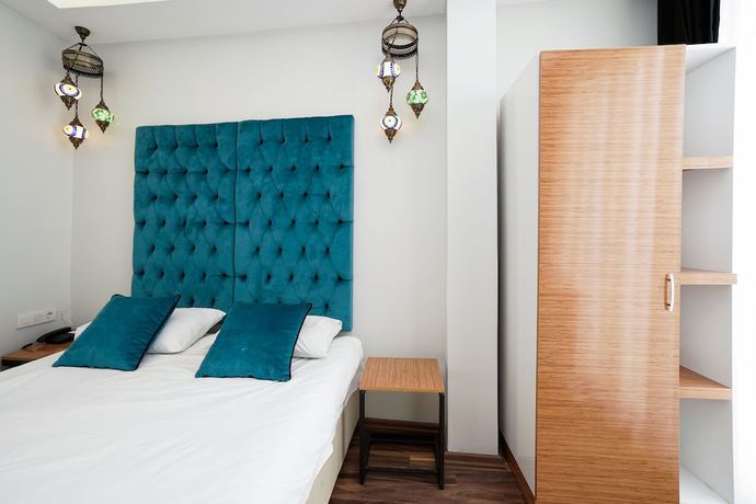 Imagen de la habitación del Alf Hotel. Foto 18