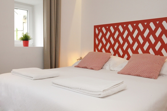 Imagen de la habitación del Alfama Yellow House. Foto 16