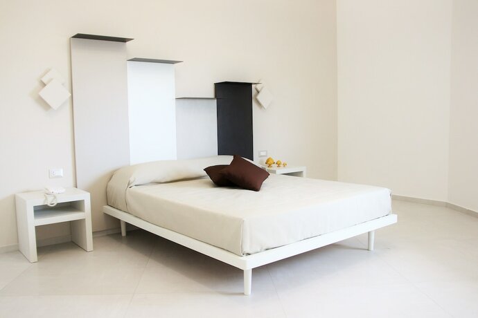 Imagen de la habitación del Alfema Rooms. Foto 18