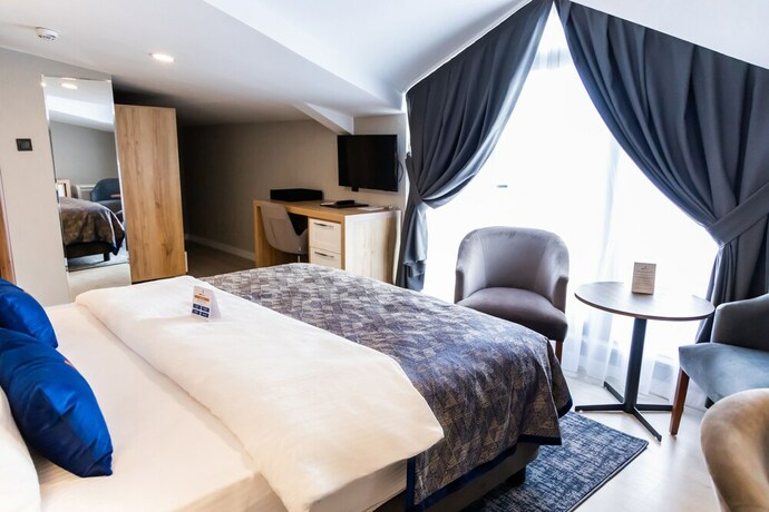 Imagen de la habitación del Aliba Hotel. Foto 18