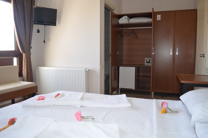 Imagen de la habitación del Alibeyhan Otel. Foto 11