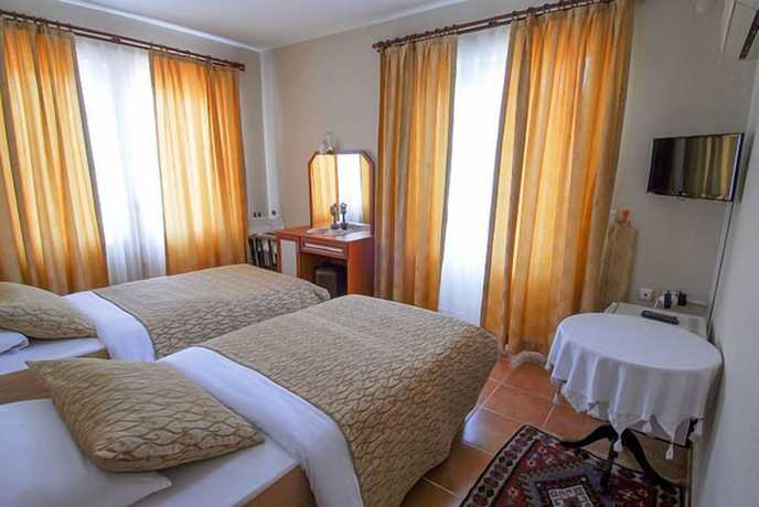 Imagen de la habitación del Alize Hotel. Foto 9
