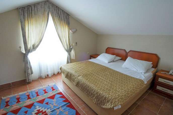 Imagen de la habitación del Alize Hotel. Foto 11