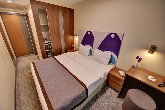 Imagen de la habitación del All Inn Hotel. Foto 6